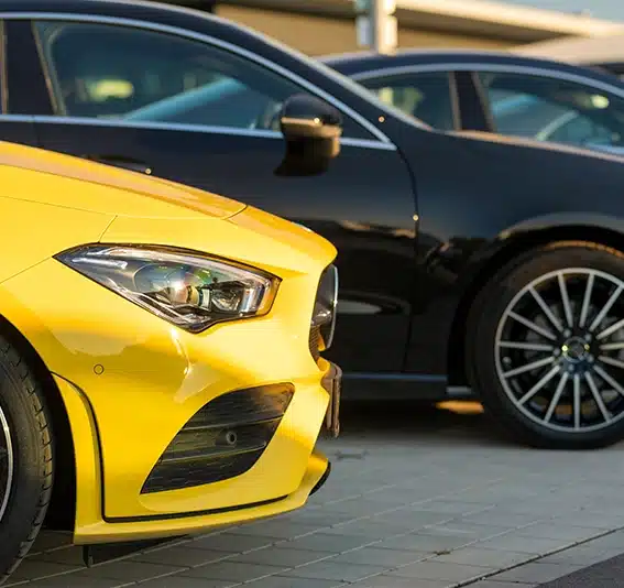 A closeup of yellow Mercedes-Benz Kla car headlight