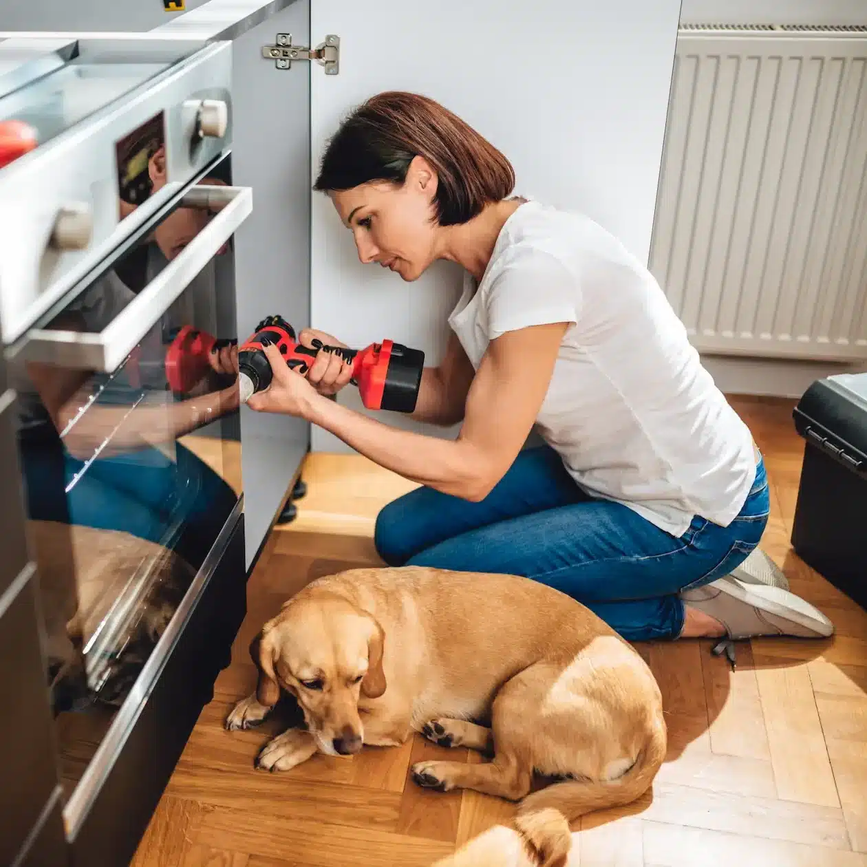A woman renovating her kitchen with upgrades