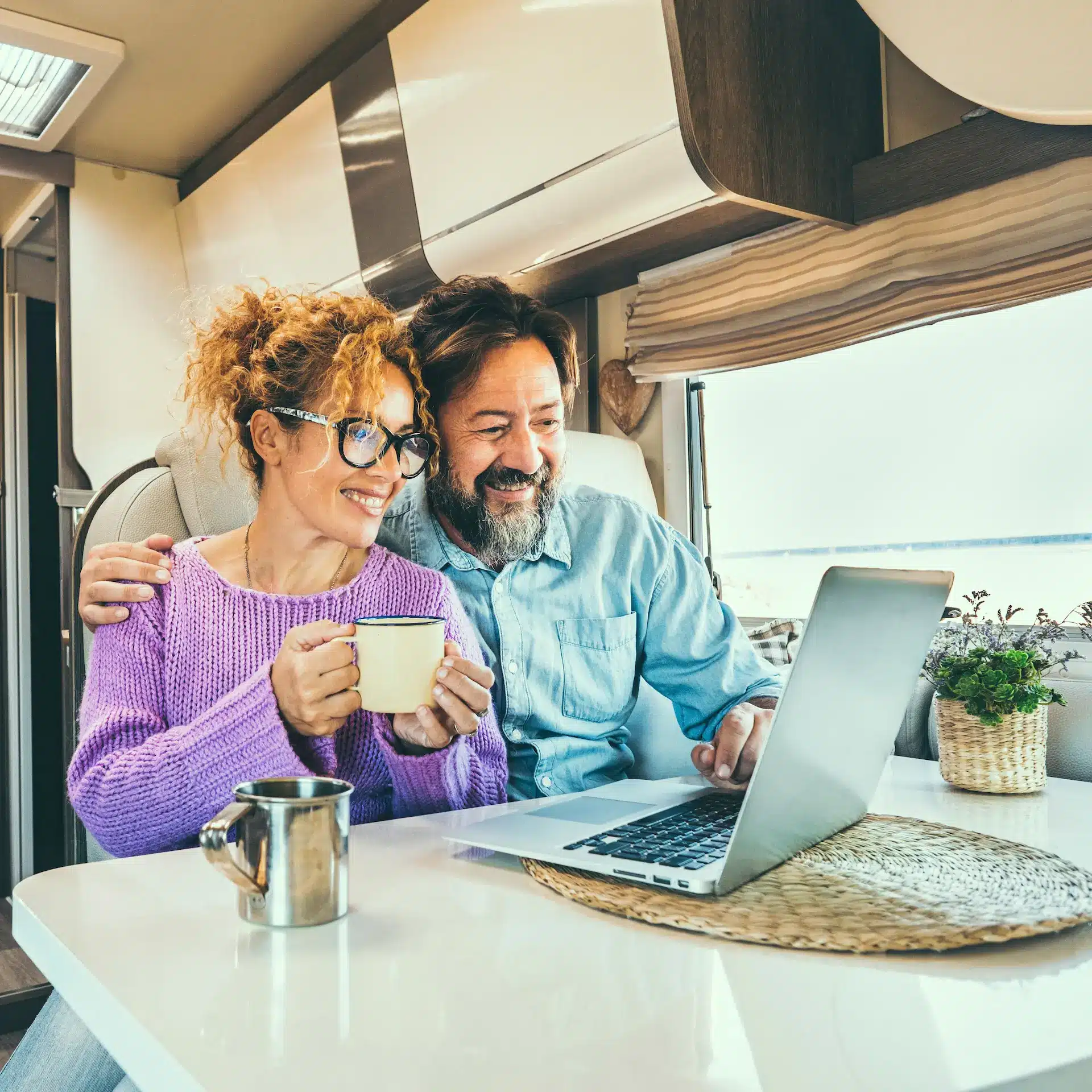 A couple discussing flexible caravan loan options after consulting with Jade Finance.