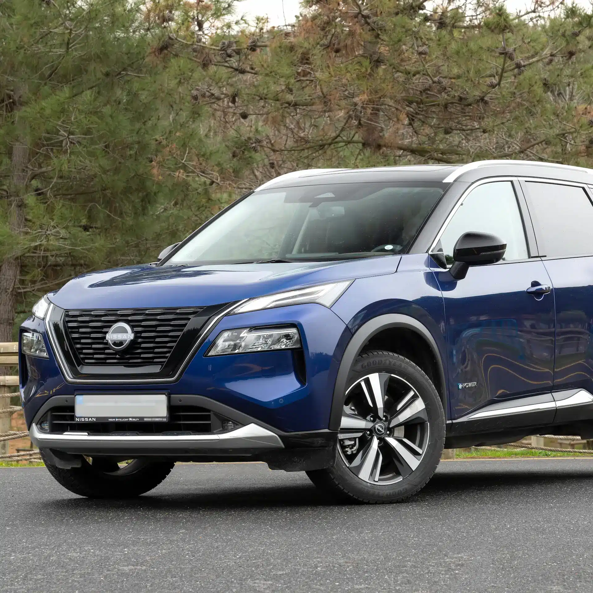 Nissan SUV parked at three quarter front angle.