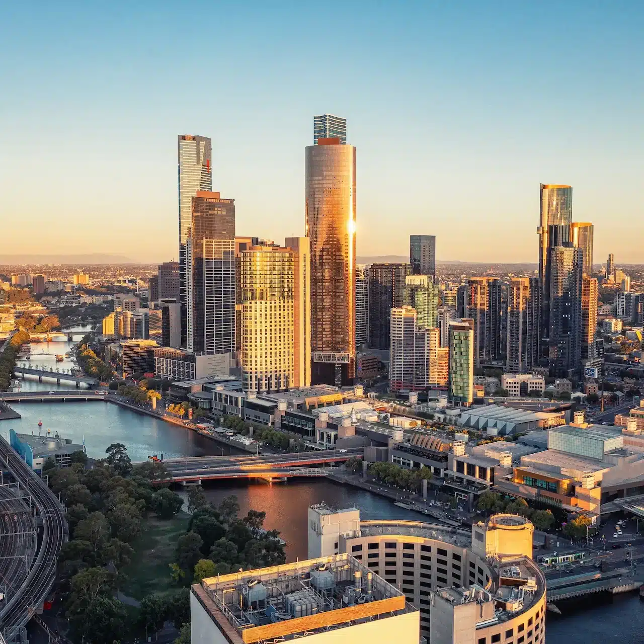 View of the Melbourne sky line from a high vantage point at sunset.